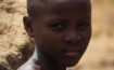 Un niño Taneka con escarificaciones en la cara Republica de Benin